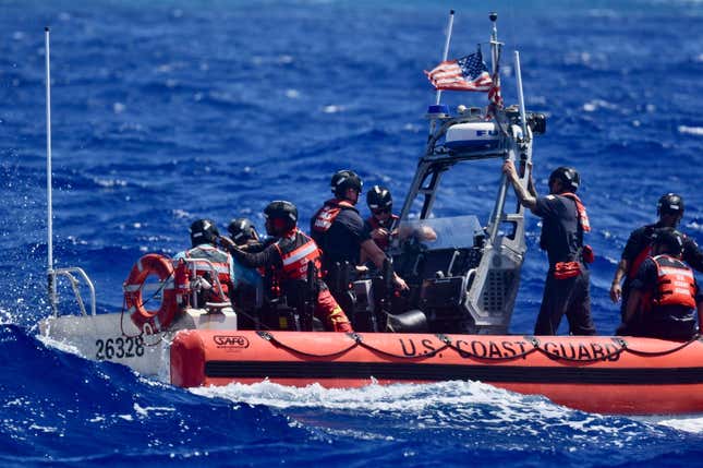 The crew of USCGC Oliver Henry (WPC 1140), having rescued three mariners stranded on Pikelot Atoll, Yap State, Federated States of Micronesia, prepare the cutter boat and the marienrs to be recovered to the cutter for further transport to Polowat Atoll, Chuuk State, on April 9, 2024.