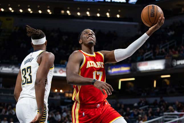 Oct 16, 2023; Indianapolis, Indiana, USA;  Atlanta Hawks forward Onyeka Okongwu (17) shoots the ball while Indiana Pacers center Myles Turner (33) defends in the second quarter at Gainbridge Fieldhouse.