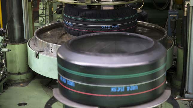 A photo of tires being made at a factory. 