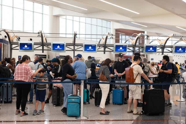 Delta passengers line up to talk with ticketing agents after cancelled and delayed flights at Hartsfield-Jackson Atlanta International Airport on July 22, 2024 in Atlanta, Georgia.