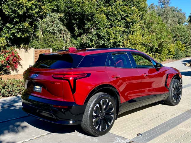 A Blazer EV RS eAWD from the rear in Radical Red Tintcoat