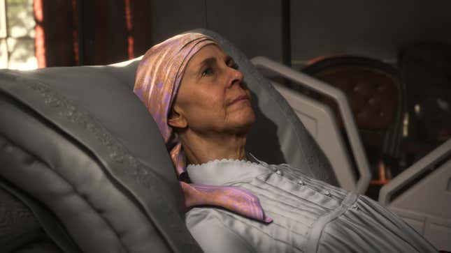 Bridget Strand lays on a hospital bed.