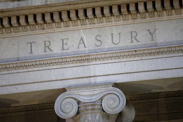 FILE- This June 6, 2019, file photo shows the U.S. Treasury Department building at dusk in Washington. The U.S. on Wednesday imposed sanctions on an online media site called Gaza Now and its founder Mustafa Ayash, for allegedly supporting Hamas. U.S. Treasury’s Office of Foreign Assets Control says that after the Oct. 7 attack by Hamas against Israel — the online entity began a fundraising effort in support of the militant organization. (AP Photo/Patrick Semansky, File)