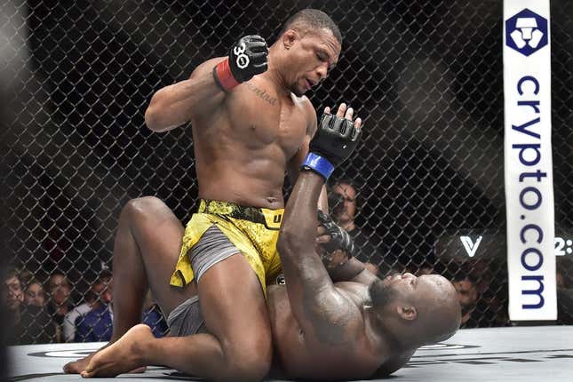 Nov 4, 2023; Sao Paulo, Brazil; Jailton Almeida (red gloves) fights Derrick Lewis (blue gloves) during UFC Fight Night at Ibirapuera Arena.