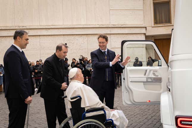 The pope being shown his new Mercedes-Benz G-wagen