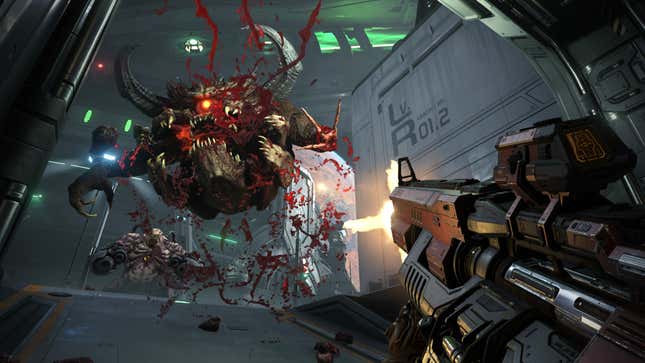 The protagonist in Doom opens fire on monsters.