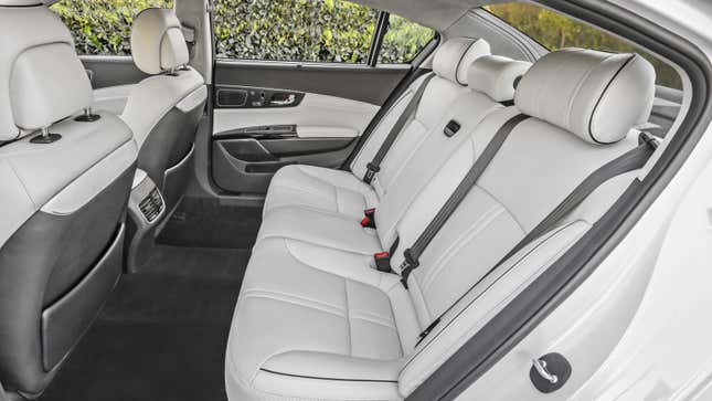 A photo of the interior of a Kia K900 sedan. 