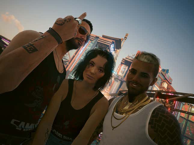 Johnny, V, and Kerry pose for a group selfie.