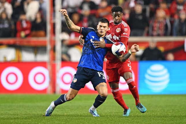 Nov 4, 2023; Harrison, NJ, USA; FC Cincinnati forward Brandon V  zquez (19) and New York Red Bulls defender Andr  s Reyes (4) battle for the ball during the first half of game two in a round one match of the 2023 MLS Cup Playoffs at Red Bull Arena.