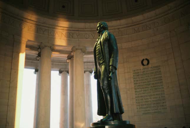 Rudulph Evans’s statue of Thomas Jefferson with excerpts of the  Declaration of Independence seen behind, Thomas Jefferson Memorial,  Washington, D.C., USA, March 1985. 