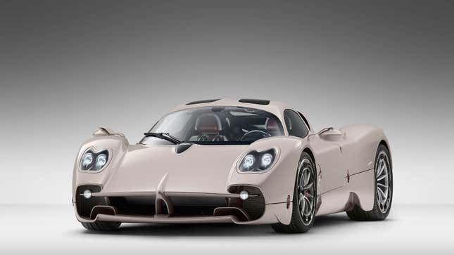 A photo of a beige Pagani Utopia supercar. 