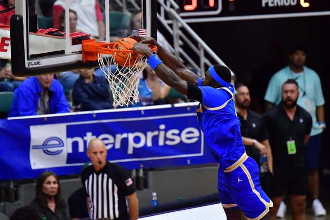 Nov 20, 2023; Honolulu, Hawaii, USA;  UCLA Bruins forward Adem Bona (3) dunks the ball against the Marquette Golden Eagles during the second period at SimpliFi Arena at Stan Sheriff Center.