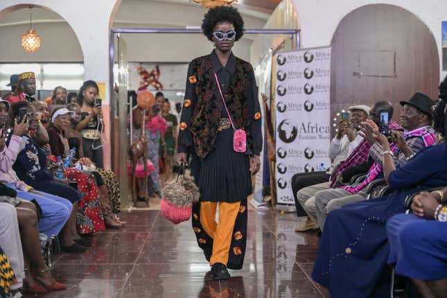 A model presents a creation by Kenyan designer Morgan Azedy during the main fashion show of the Africa Fashion Week, in Nairobi, Kenya on Dec. 9, 2023.