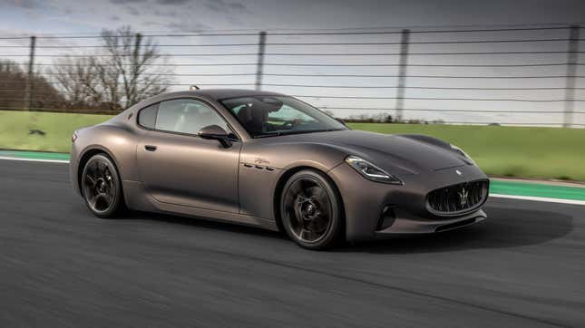 A bronze Maserati GranTurismo Folgore going around a racetrack