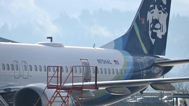 Alaska Airlines N704AL, a 737 Max 9, which made an emergency landing at Portland International Airport on January 5 is parked at a maintenance hanger in Portland, Oregon on January 23, 2024.