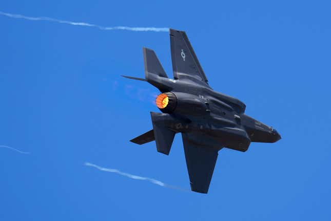 FILE - U.S. Air Force fighter aircraft F-35 performs aerobatic maneuvers on the second day of the Aero India 2023 at Yelahanka air base in Bengaluru, India, Tuesday, Feb. 14, 2023. On Monday Jan. 29, 2024, The Czech Republic&#39;s government inked a deal with the United States to acquire two dozen U.S. F-35 fighter jets in a deal worth around 150 billion Czech koruna ($6.5 billion). (AP Photo/Aijaz Rahi, File)