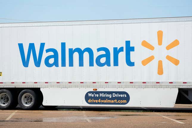 FILE - A tractor trailer bearing the Walmart logo also serves the dual purpose of advertising the company&#39;s need for tractor trailer drivers as seen in Richland, Miss., Sept. 6, 2023. Walmart is further sweetening the perks for its U.S. store managers as the nation’s largest retailer and private employer seeks to retain and attract top workers in a still competitive job market. Walmart, which is based in Bentonville, Ark. and has almost 4,700 U.S. namesake stores, said Monday, Jan. 29, 2024 that starting with the company’s new fiscal year, which begins Thursday, U.S. store leaders will receive up to $20,000 in Walmart stock grants every year. (AP Photo/Rogelio V. Solis, file)