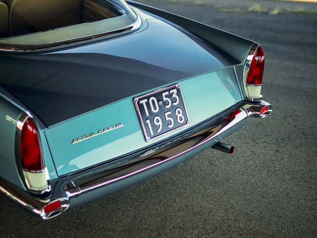 Taillights of a teal Aston Martin DB2/4 by Bertone