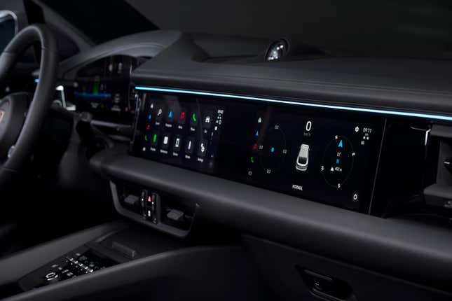 Close-up view of the dashboard screens in a 2024 Porsche Macan EV