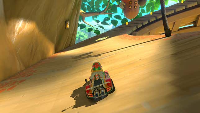 Bowser Jr. races forward on a track in Acorn Heights.