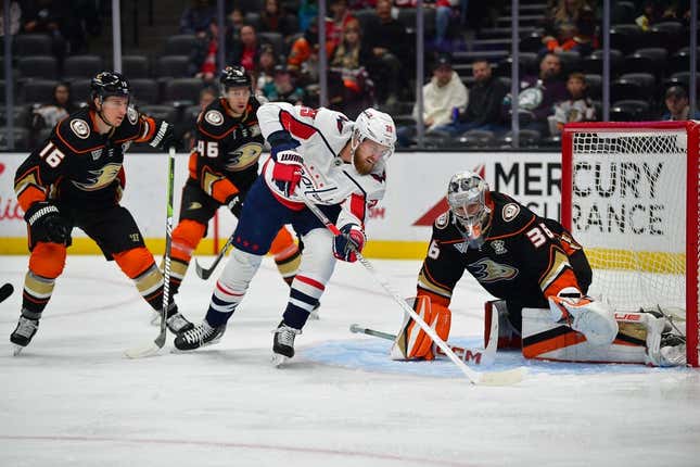 Nov 30, 2023; Anaheim, California, USA; Washington Capitals right wing Anthony Mantha (39) moves in to score a goal against Anaheim Ducks goaltender John Gibson (36) during the first period at Honda Center.
