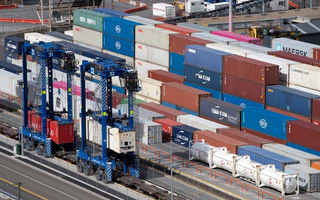 FILE - Shipping containers are moved at the Port of Lyttelton near Christchurch, New Zealand, on Sept. 17, 2020. New Zealand has entered its second recession in 18 months after the latest round of GDP figures confirmed its economy contracted in the last quarter of 2023. The country&#39;s economy shrank by 0.1% in the quarter to December, and 0.7% in per capita terms, the New Zealand&#39;s official statistics agency, Stats NZ, announced on Thursday, March 21, 2024. (AP Photo/Mark Baker, File)