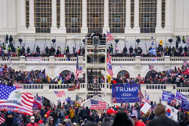 Insurrectionists breach the Capitol in Washington, Jan. 6, 2021.