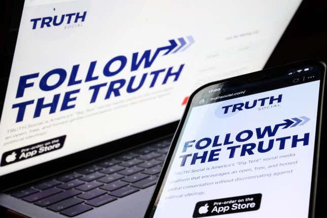 A phone and a laptop show the landing page on the Truth Social website. Its slogan reads "Follow the truth" with a stylized arrow emerging from the "W" in "follow."