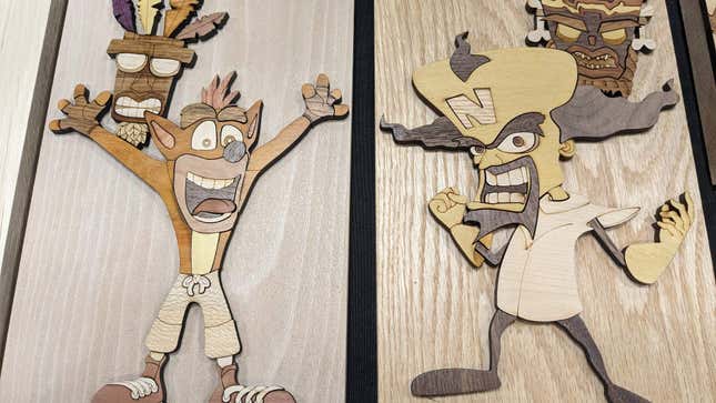 Crash and Neo Cortex are displayed on wooden art.