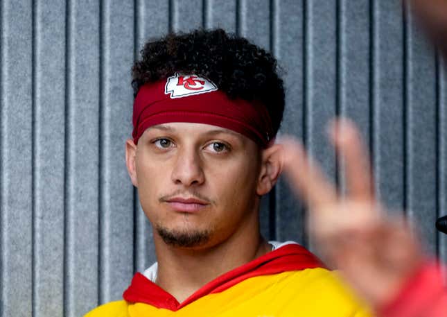 Kansas City Chiefs quarterback Patrick Mahomes leans against a wall before attending a press conference in Frankfurt, Germany, Friday, Nov. 3, 2023. The Kansas City Chiefs are set to play the Miami Dolphins in a NFL game in Frankfurt on Sunday Nov. 5, 2023. (AP Photo/Michael Probst)