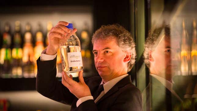 A photo of the founder of Celtic Renewables holding a sample of biofuel. 