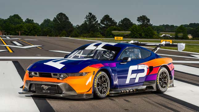 A photo of a blue and orange Ford Mustang GT3 racer. 