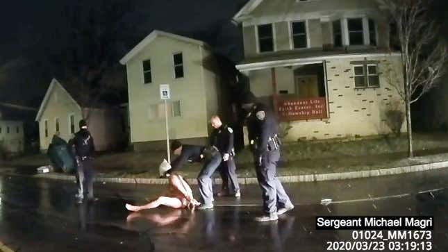 In this image taken from police body camera video provided by Roth and Roth LLP, a Rochester police officer puts a hood over the head of Daniel Prude, on March 23, 2020, in Rochester, N.Y. 