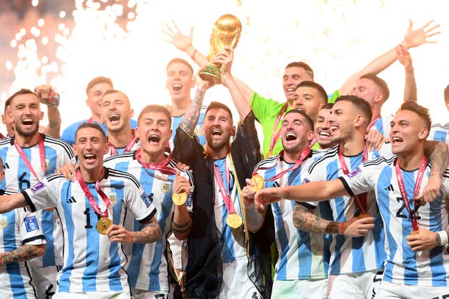 Lionel Messi of Argentina lifts the FIFA World Cup Qatar 2022 Winner's Trophy following the FIFA World Cup Qatar 2022 Final match between Argentina and France at Lusail Stadium on December 18, 2022 in Lusail City, Qatar.