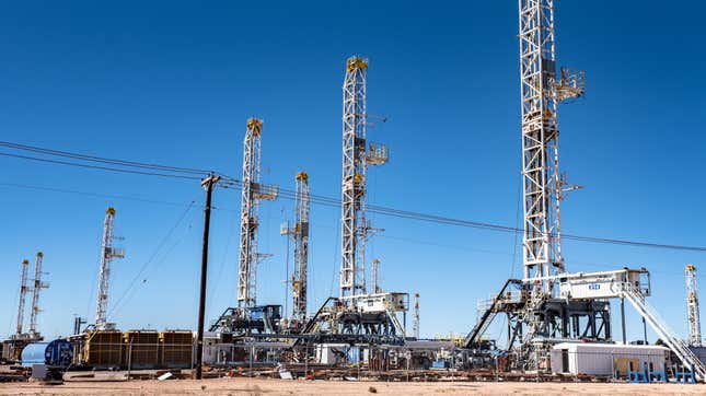 Oil rigs stand in the Permian Basin area of Odessa, Texas, U.S., on Saturday, Jan. 19, 2019.