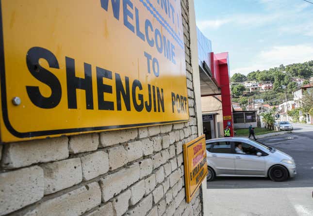 A car exits from the port of Shengjin, northwestern Albania, on Tuesday, Nov. 7, 2023. Italian Premier Giorgia Meloni announced that Albania had agreed to give temporary shelter to thousands of migrants who try to reach Italian shores while their asylum bids are being processed. Albania will offer two facilities, a quarantine area at the port of Shengjin and an accommodation center for those who will be deported at a former military airport in Gjader. (AP Photo/Armando Babani)