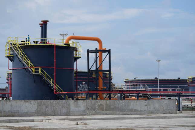 FILE - A view of oil installations at the Dangote refinery during the opening ceremony in Lagos, Nigeria, Monday, May 22, 2023. Nigeria’s Dangote Petroleum Refinery, which is Africa’s biggest, says it has begun production, starting with diesel and aviation fuel. This brings to an end a yearslong wait for a plant that analysts said Monday, Jan. 15, 2024 could boost local and regional refining capacity in a region heavily reliant on imported refined products. (AP Photo/Sunday Alamba, File)