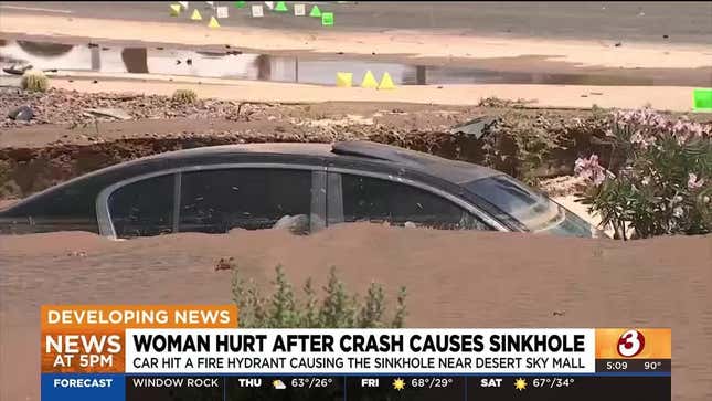 Phoenix car crash causes sinkhole