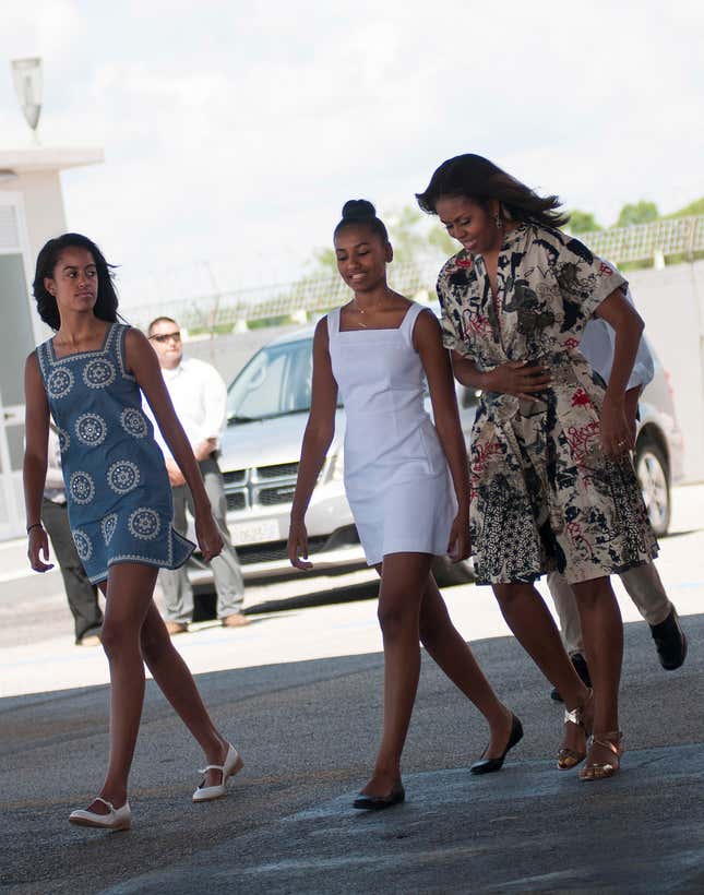 VENICE, ITALY - JUNE 21: First Lady Michelle Obama leaves with her daughters Malia Obama (L) and Sasha Obama (C) in Venice, Italy on June 21, 2015. First Lady Michelle Obama is in Italy where she will speak about the 