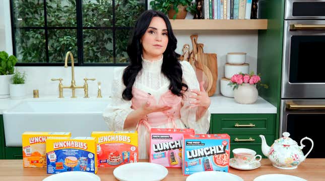  Rosanna Pansino opens a box of Lunchlys. 