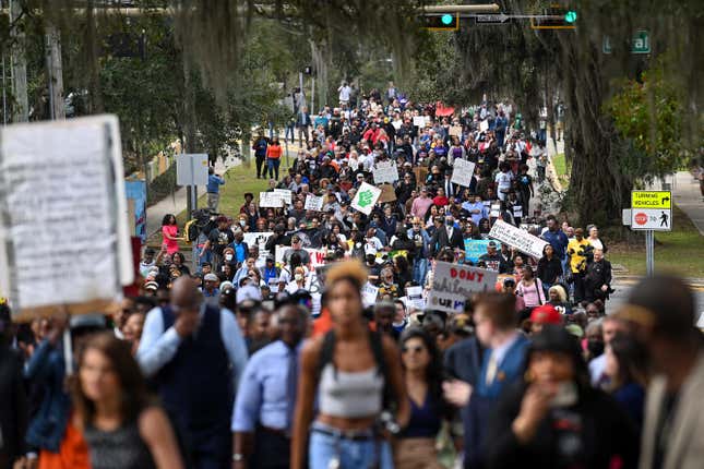 Demonstrators protest Florida Governor Ron DeSantis plan to eliminate Advanced Placement courses on African American studies in high schools as they march to Floridas State Capitol on February 15, 2023 in Tallahassee, Florida