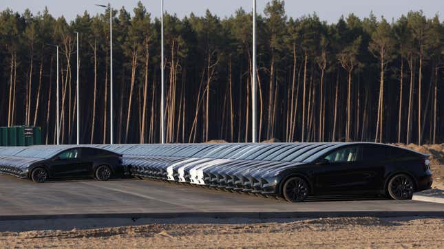 Newly completed Tesla Model Y electric cars stand at the new Tesla Gigafactory electric car manufacturing plant on March 21, 2022 near Gruenheide, Germany. 