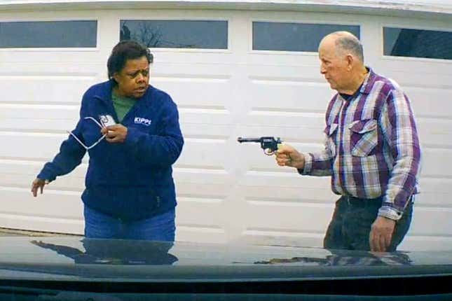 In this image taken from Uber dashcam video released by the Clark County, Ohio, Sheriff&#39;s Office, William Brock, right, holds a weapon to Uber driver Loletha Hall outside his home in South Charleston, Ohio, on March 25, 2024. Brock, 81, who authorities say fatally shot Hall who he thought was trying to rob him after scam phone calls deceived them both, was indicted on a murder charge, Monday, April 15, 2024, by a Clark County grand jury. Hall had no knowledge of the calls made to Brock, authorities said. (Clark County Sheriff&#39;s Office via AP)