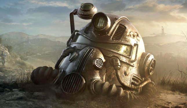 A power armor helmet lies in the dirt