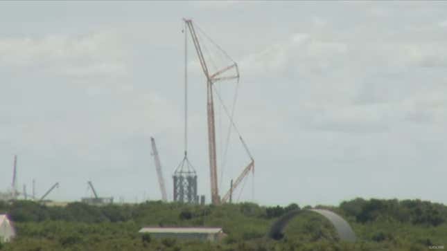Earlier today, a crane creating the first stack for a tower that will eventually reach more than 400 feet in height.  