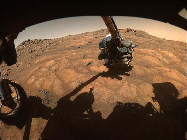 The robotic arm on NASA's Perseverance rover reached out to examine rocks in an area on Mars