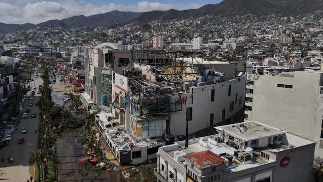 Damaged buildings stand after Hurricane Otis ripped through Acapulco, Mexico, Thursday, Oct. 26, 2023. The hurricane that strengthened swiftly before slamming into the coast early Wednesday as a Category 5 storm has killed at least 27 people as it devastated Mexico&#39;s resort city of Acapulco. (AP Photo/Felix Marquez)