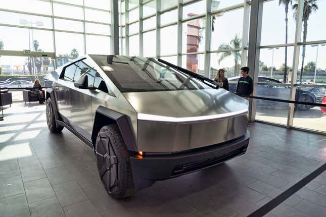 A Tesla Cybertruck is on display at the Tesla showroom in Buena Park, Calif. on Sunday Dec. 3, 2023. Tesla is recalling 3,878 of its 2024 Cybertrucks after it discovered that the accelerator pedal can become stuck, potentially causing the vehicle to accelerate unintentionally and increasing the risk of a crash. (AP Photo/Richard Vogel)