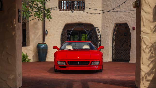 A photo of a red Ferrari sports car. 