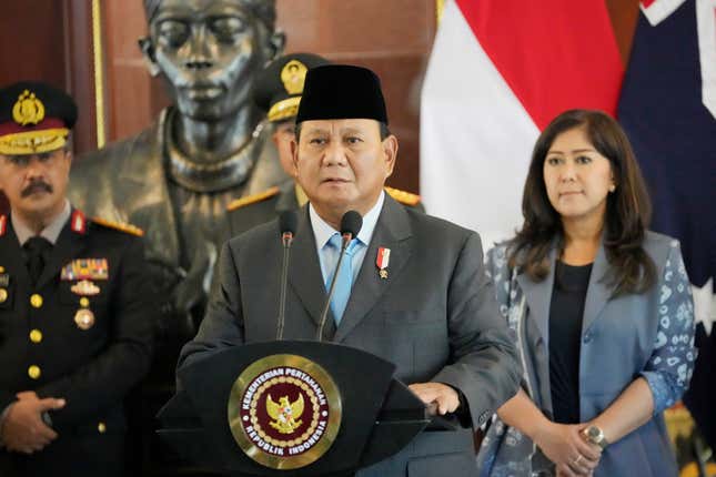 Indonesian Defense Minister Prabowo Subianto speaks to journalist during a joint press conference with Australian Deputy Prime Minister and Defense Minister Richard Marles following their meeting in Jakarta, Indonesia, Friday, Feb. 23, 2024. (AP Photo/Achmad Ibrahim)